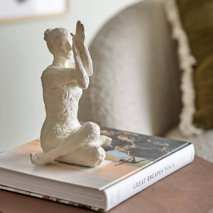 praying yoga pose figure