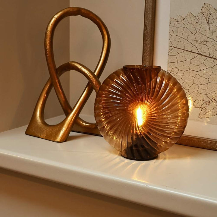 antique gold loop sculpture